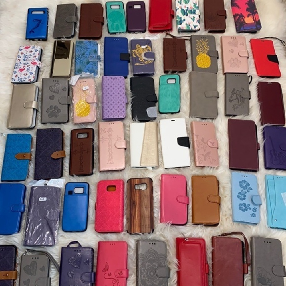 Bundle of 56 Phone Cases for Android devices.